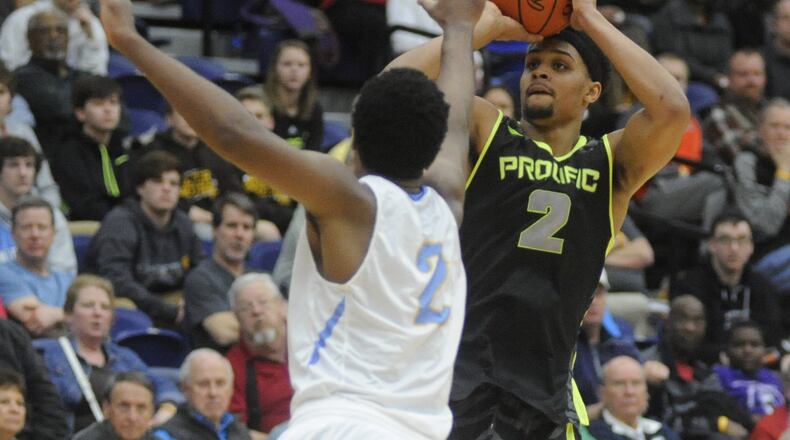 Gary Trent Jr. of Prolific Prep (shooting) tallied a game-high 33 points in a 66-64 loss to Huntington Prep during Day 3 of the Premier Health Flyin’ to the Hoop at Trent Arena in Kettering on Sunday, Jan. 15, 2017. MARC PENDLETON / STAFF