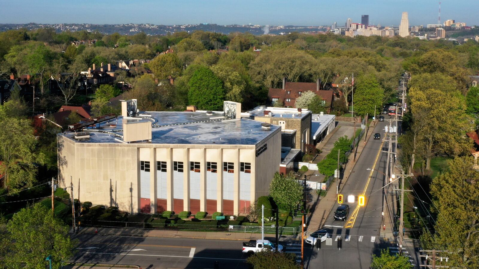 FILE - The Tree of Life Synagogue, lower left, stands in the Squirrel Hill neighborhood of Pittsburgh, April 19, 2023. (AP Photo/Gene J. Puskar, File)