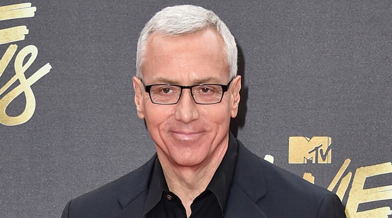 FILE - In this April 9, 2016 file photo, Drew Pinsky arrives at the MTV Movie Awards in Burbank, Calif. Pinsky's show "Dr. Drew," has been canceled by the HLN network. His last episode will air on Sept. 22. (Photo by Jordan Strauss/Invision/AP, File)