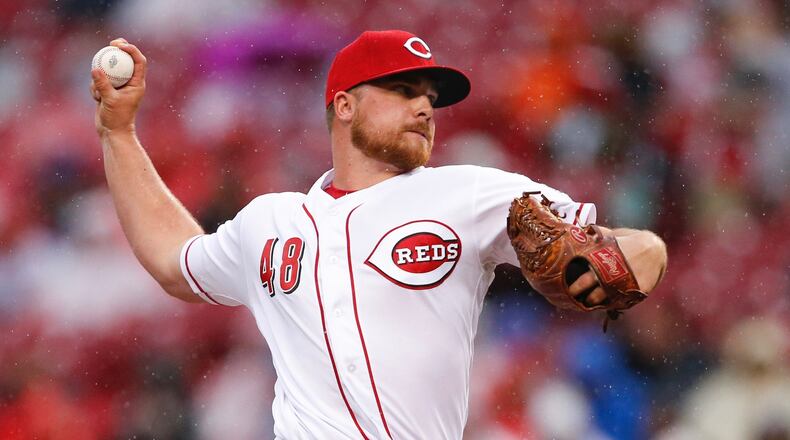 Reds relief pitcher Barrett Astin throws in the fifth inning against the Phillies on Monday, April 3, 2017, in Cincinnati. (AP Photo/Gary Landers)