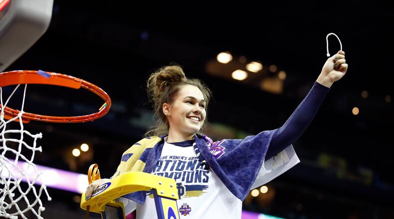 COLUMBUS, OH - APRIL 01: Kathryn Westbeld #33 of the Notre Dame Fighting Irish cuts down the net after scoring the game winning basket to defeat the Mississippi State Lady Bulldogs in the championship game of the 2018 NCAA Women’s Final Four at Nationwide Arena on April 1, 2018 in Columbus, Ohio. The Notre Dame Fighting Irish defeated the Mississippi State Lady Bulldogs 61-58. (Photo by Andy Lyons/Getty Images)