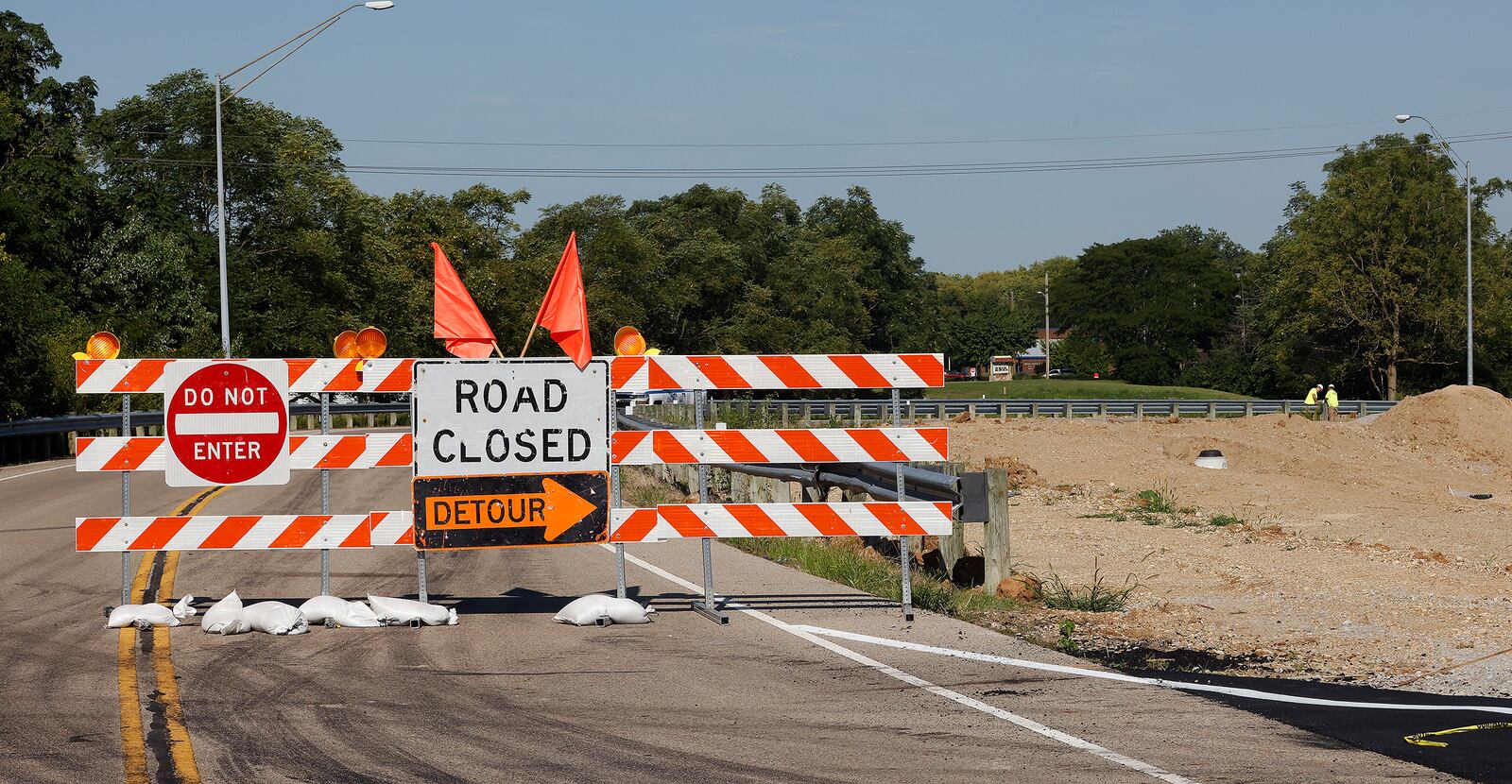 Manchester Road at E. Dixie Drive is closed in West Carrollton. Manchester Road traffic is being routed onto a temporary roadway through the old Roberts site. MARSHALL GORBY\STAFF