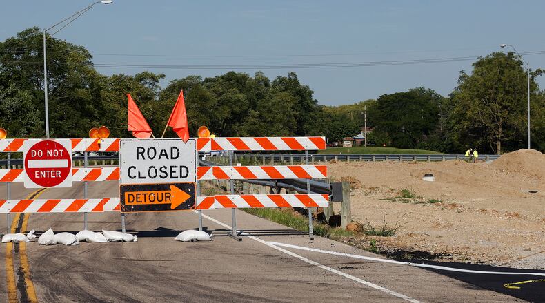 Manchester Road at E. Dixie Drive is closed in West Carrollton. Manchester Road traffic is being routed onto a temporary roadway through the old Roberds site. MARSHALL GORBY\STAFF