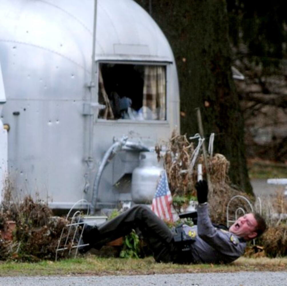 Patrolman shot at Enon Beach