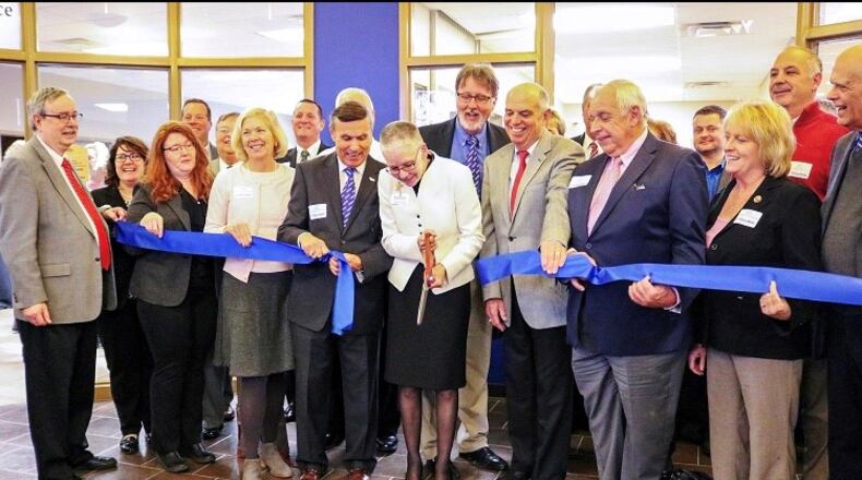 Edison State President Dr. Doreen Larson cuts the ribbon to the Campus at Eaton