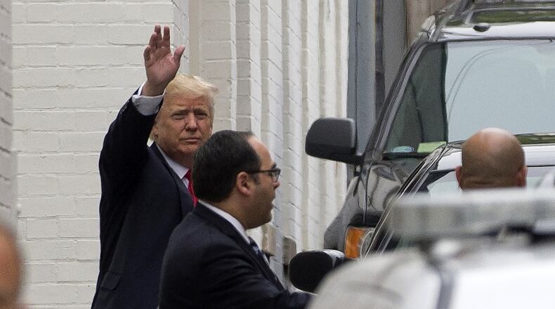 Donald Trump, the presumptive Republican nominee, arrives for a meeting with House Speaker Paul Ryan (R-Wis.) at the Republican National Committee in Washington, May 12, 2016. As his party splinters and his policy agenda faces peril, Ryan will enter his meeting with Trump on Thursday increasingly at odds with a growing, if grudging, Republican congressional majority willing to embrace Trump as their candidate. (Stephen Crowley/The New York Times)