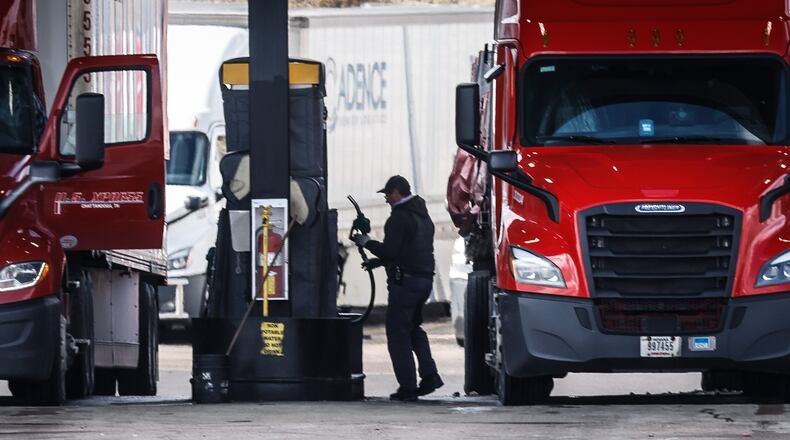 A trucker fills up his rig at Love's Travel stop at Edwin C. Moses and Interstate 75 in Dayton. Diesel fuel prices have been rising because of supple chain issues. JIM NOELKER/STAFF