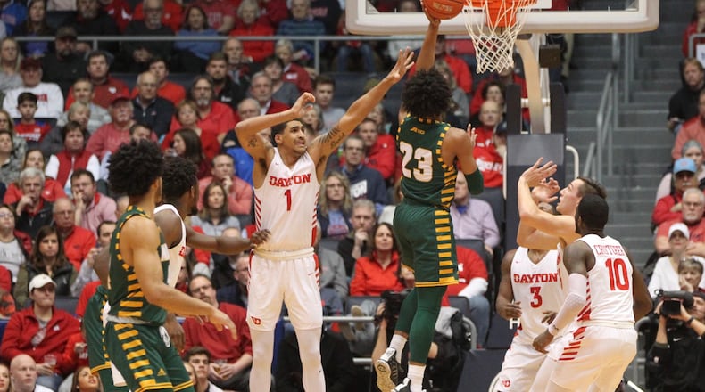 George Mason’s Javon Greene shoots against Dayton on Wednesday, Jan. 23, 2019, at UD Arena. David Jablonski/Staff