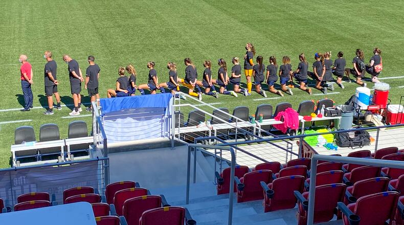 Samantha Leshnak-Murphy, a goalie for the North Carolina Courage, a member of the National Women’s Soccer League, stood for the National Anthem Saturday night while her teammates knelled. CONTRIBUTED BY ALEX VEJAR / THE SALT LAKE TRIBUNE.