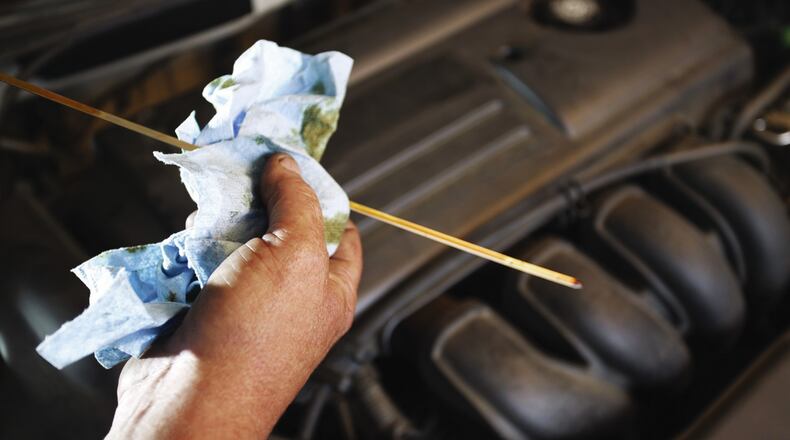 Oil checks and changes are vital to engine health. Photo by Metro Creative Graphics