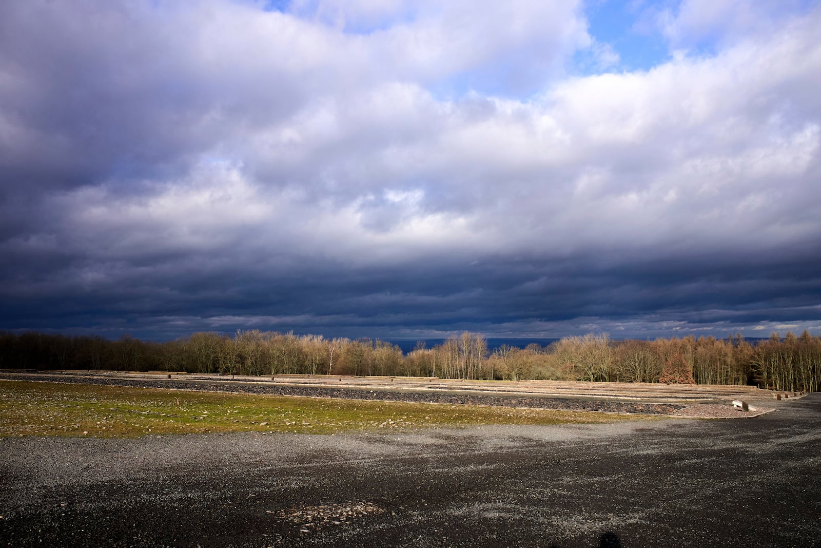 FILE — In this Friday, Jan. 10, 2020 taken photo clouds hang over the area of the Nazi death camp 'Buchenwald' in Weimar, Germany. (AP Photo/Markus Schreiber, File)