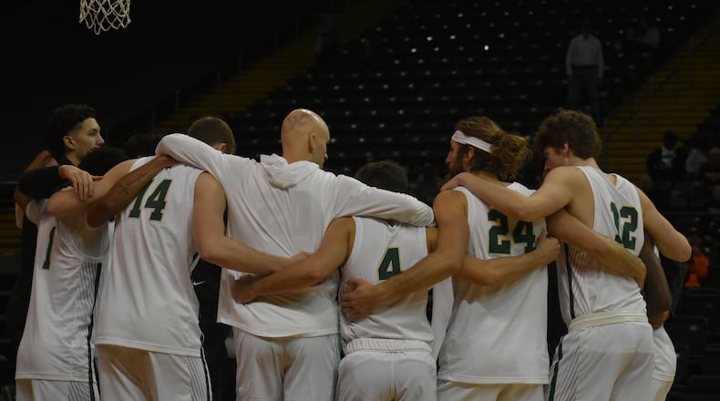 Wright State huddles before Saturday's game vs. Northwestern Ohio at the Nutter Center. Wright State Athletics photo