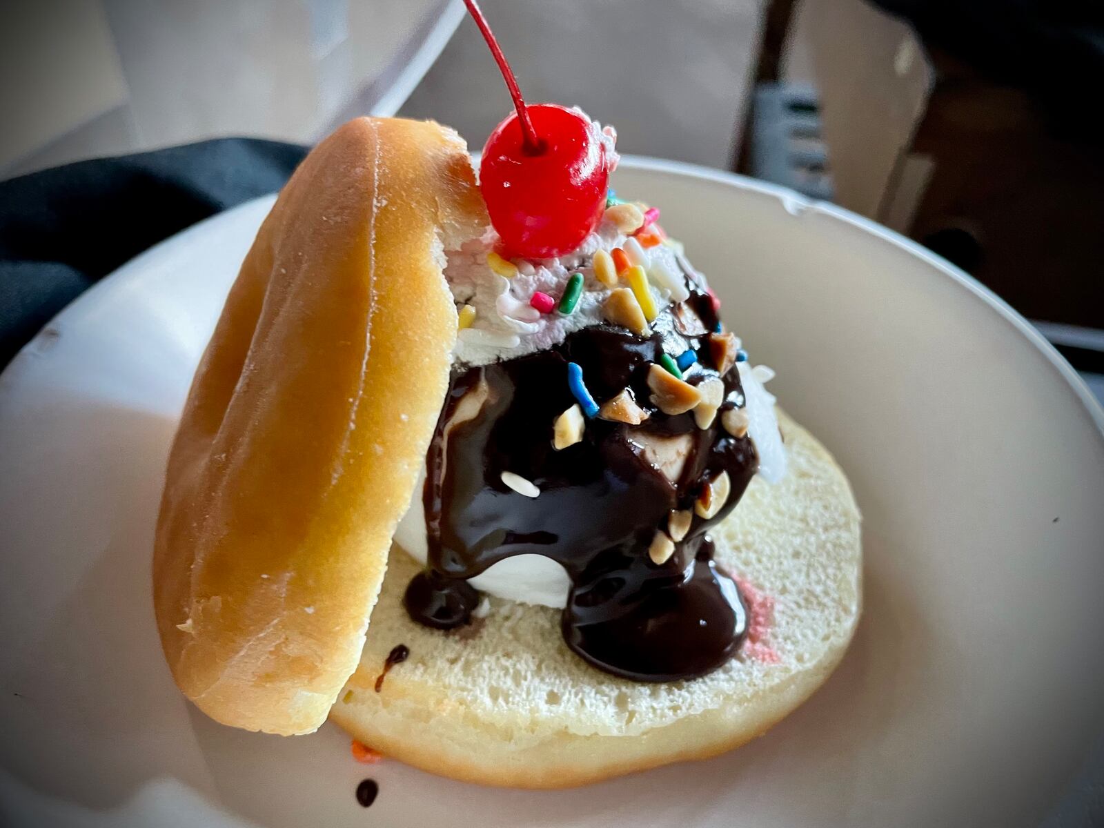 CMX CinéBistro at the Liberty Center has launched a new menu offering elevated theater food and snacks. Pictured is the donut sundae. NATALIE JONES/STAFF