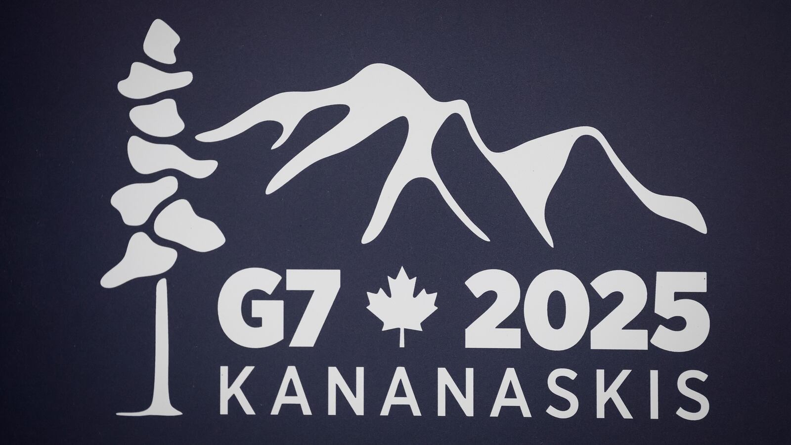 FILE - A logo for the G7 2025 Kananaskis meeting is pictured at a news conference in Banff, Alberta, Canada, May 22, 2025. (Jeff McIntosh/The Canadian Press via AP, file)