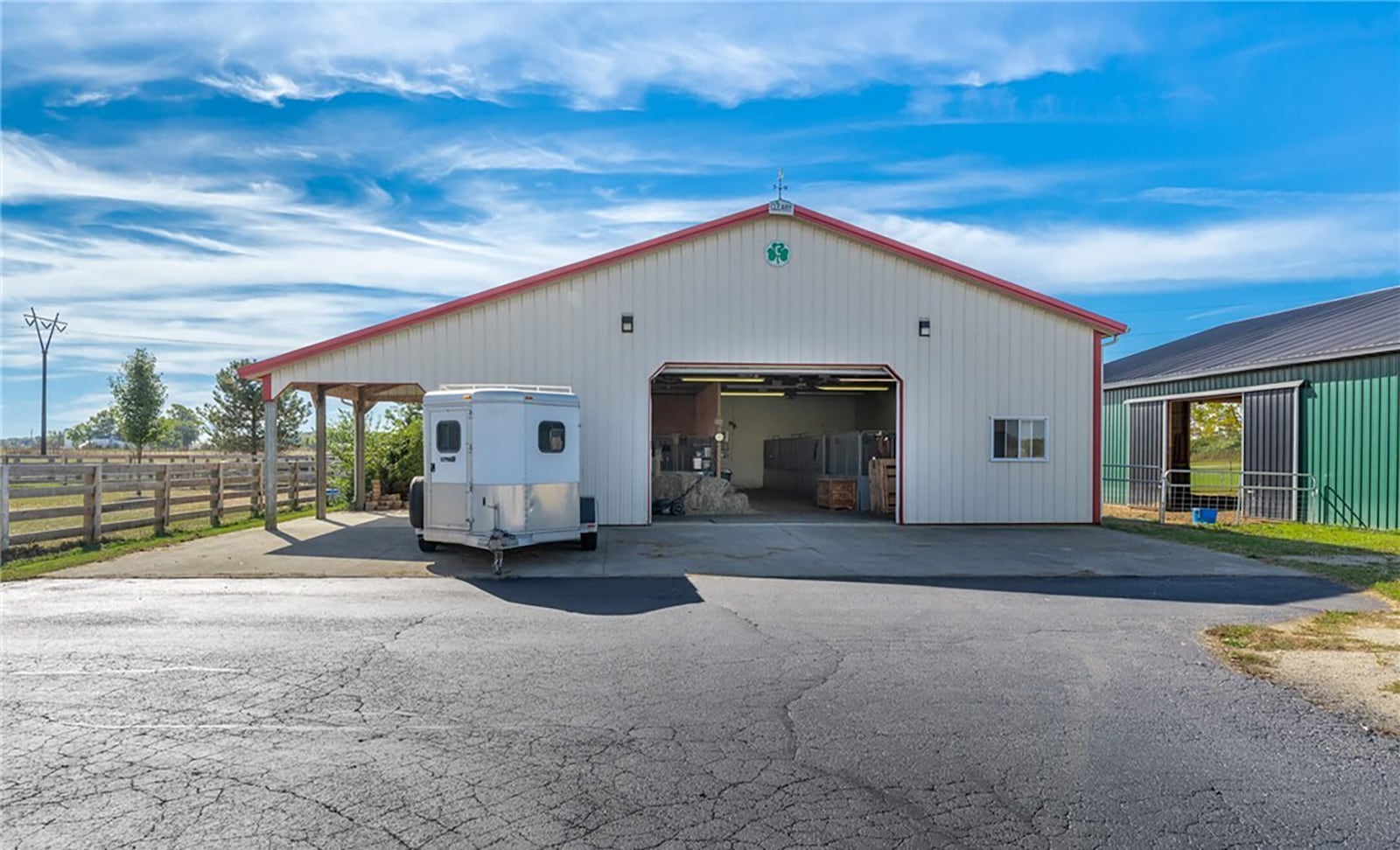 The ten acre property includes two barns. There are horse stalls, indoor and outdoor arenas and three fenced in pastures. CONTRIBUTED