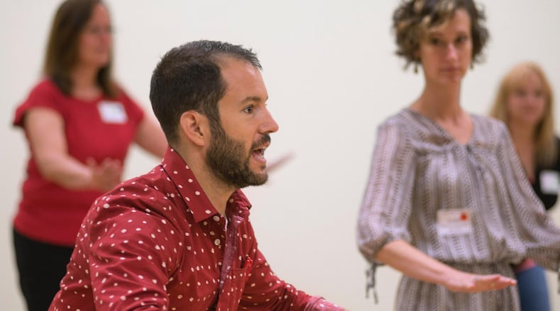 Teaching artist Ryan Conarro of Ping Chong + Company works alongside Muse Machine teachers. CONTRIBUTED