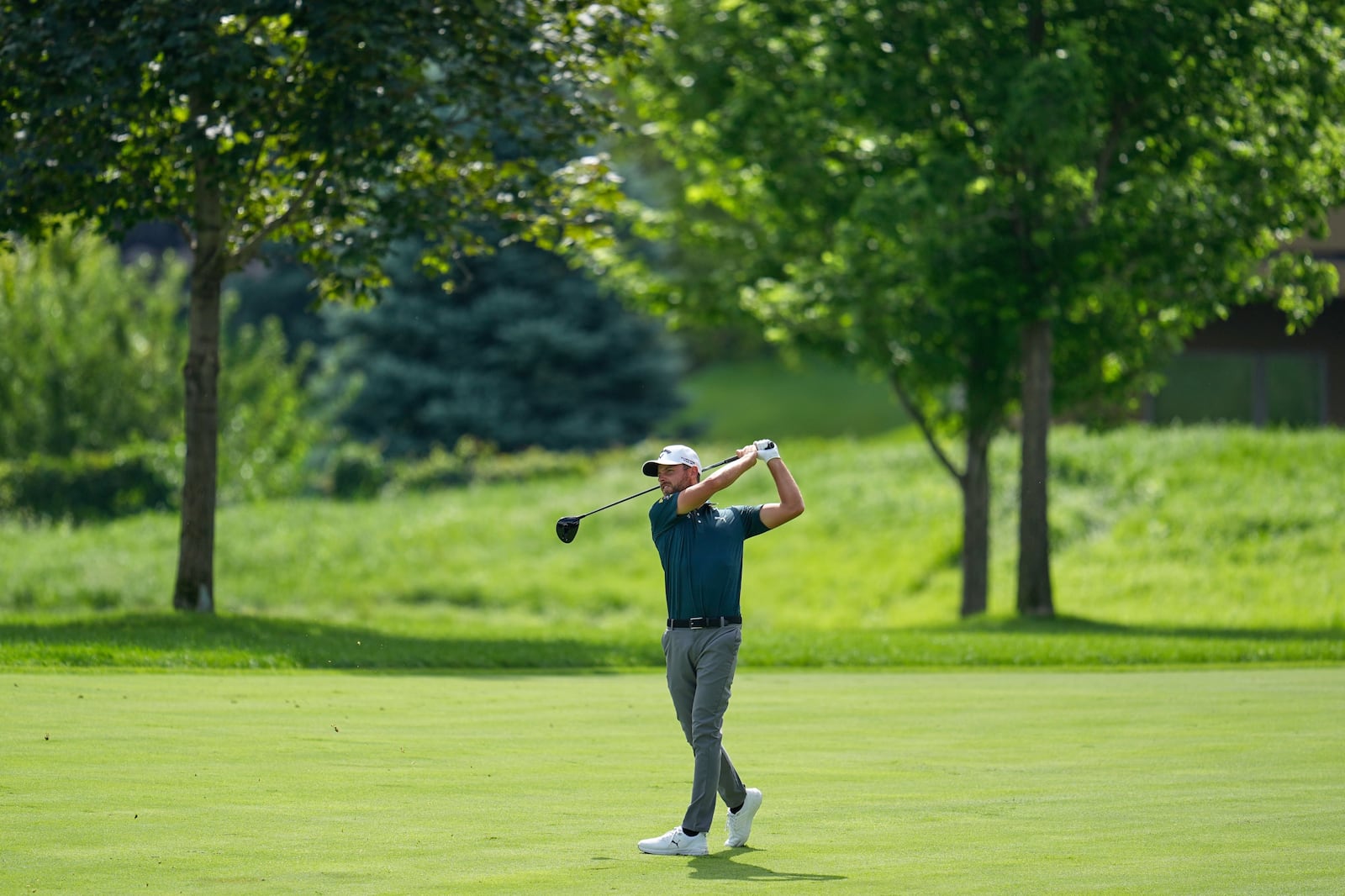 Adam Svensson hits from the 12th fairway during the first round of the 3M Open golf tournament at the Tournament Players Club Thursday, July 24, 2025, in Blaine, Minn. (AP Photo/Abbie Parr)