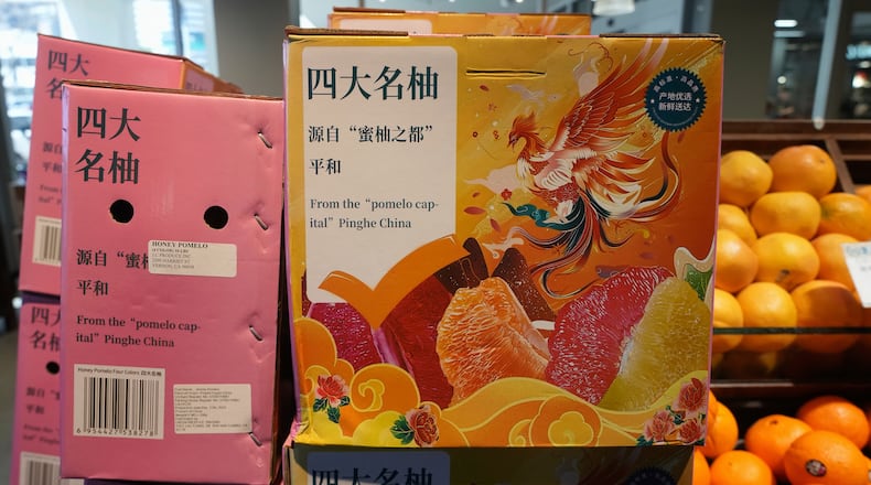 Pomelo citrus fruits imported from Pinghe County, China are sold at various grocery stores. AP PHOTO/DAMIAN DOVARGANES