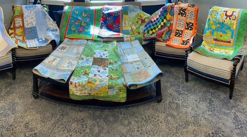 The Gold Heart Quilters donate handmade quilts to area organizations.