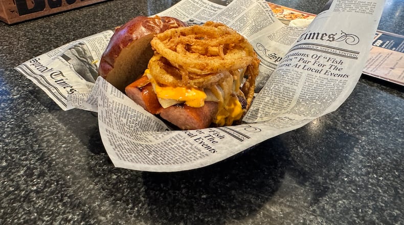 The Boom Boom Burger at Broadway Barrel House features Angus beef, kielbasa, pepper jack and boom boom sauce. CONTRIBUTED
