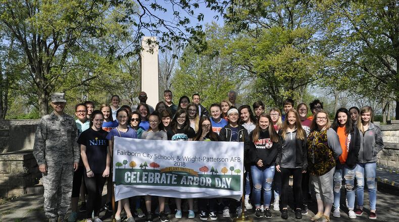 Col. Bradley McDonald, 88th Air Base Wing commander, stands with 32 Fairborn City School children who planted 300 tree seedlings May 7 at the Wright Memorial in Area B to honor Arbor Day. Fairborn City Schools, the National Park Service and the 88th Civil Engineering Group partnered this year to coordinate the project. (U.S. Air Force photo/W. Eugene Barnett Jr.)