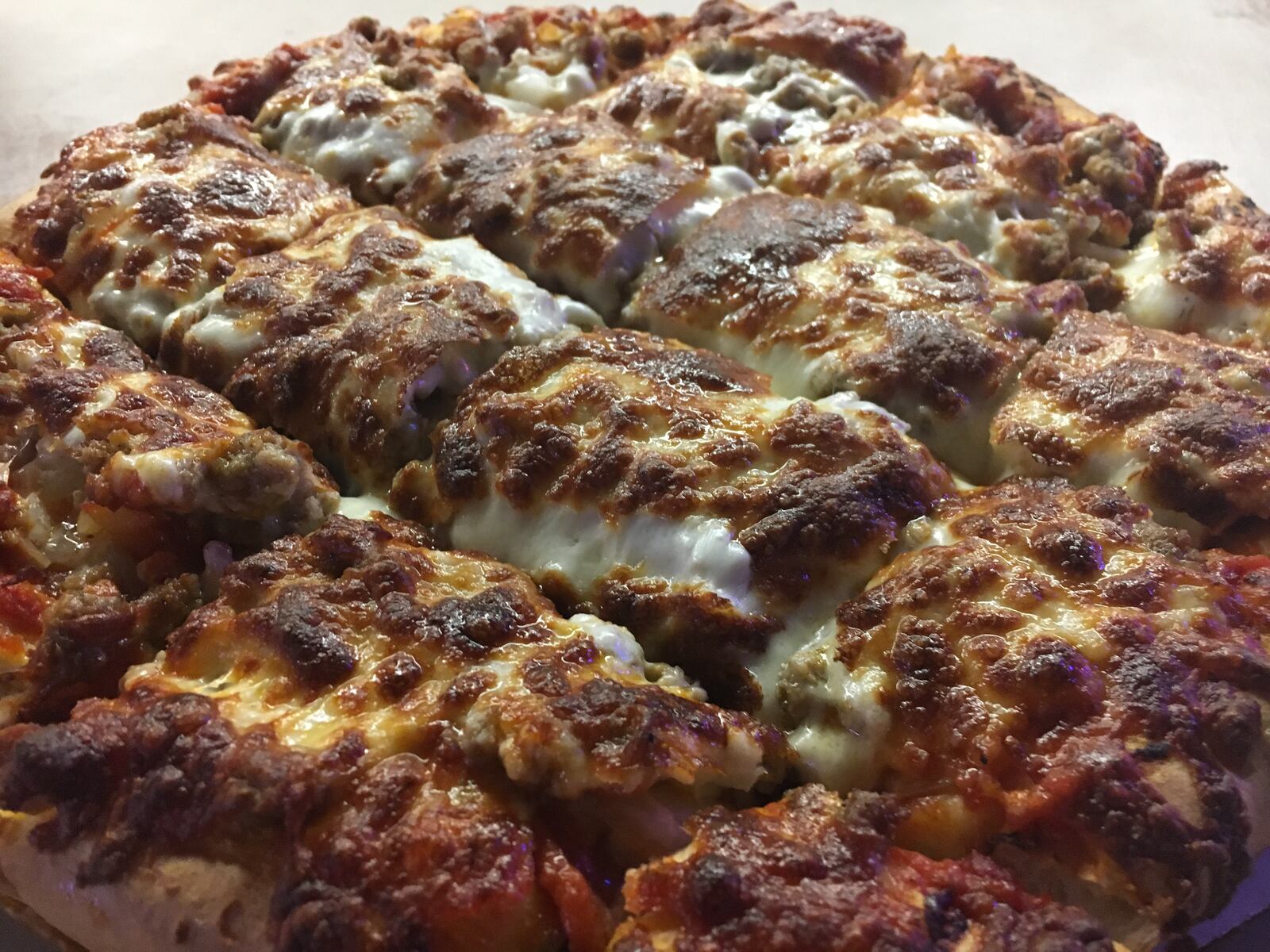 The pizza is one of the main reasons people come to Kramer's.