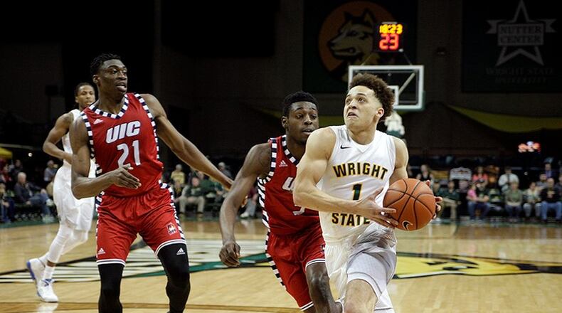 Wright State’s Justin Mitchell drives against Illinois-Chicago at the Nutter Center on Feb. 26, 2017. TIM ZECHAR/CONTRIBUTED