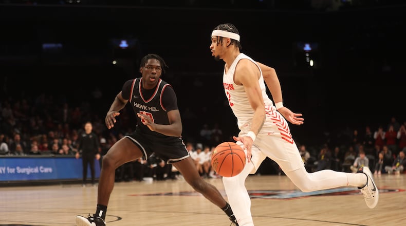 Dayton's Toumani Camara dribbles against Saint Joseph’s in the quarterfinals of the Atlantic 10 Conference tournament on Thursday, March 9, 2023, at the Barclays Center in Brooklyn, N.Y. David Jablonski/Staff