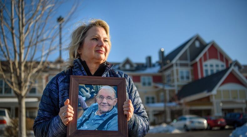 Joan Maurer held a photograph of her late father Gerald Seeger who died nearly a year ago at this senior home, Lighthouse of Columbia Heights. Attorneys for the senior facility are claiming that her wrongful death lawsuit should be thrown out because she signed an arbitration clause. (Glen Stubbe/Minneapolis Star Tribune/TNS)