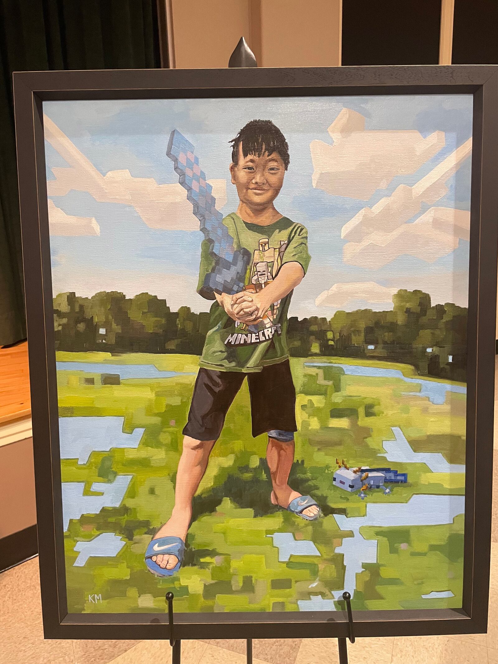 Xin Farley of Centerville, son of Angie and Julian Farley, was painted by professional, internationally-recognized artist Kevin Muente. The Farley family took home the original painting to display atop Xin’s bedroom book shelf, while a replica of the portrait will be displayed inside Shriners alongside the other three portraits.