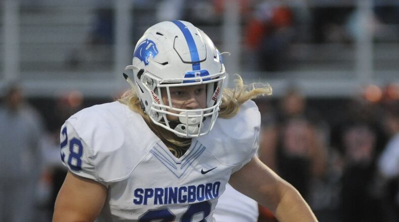 Springboro High School senior Liam Foley has promised to donate his shaved flowing hair, likely to Locksoflove.org in honor of stricken teammate and close friend Mac Reese, who was diagnosed with leukemia three weeks ago. MARC PENDLETON / STAFF