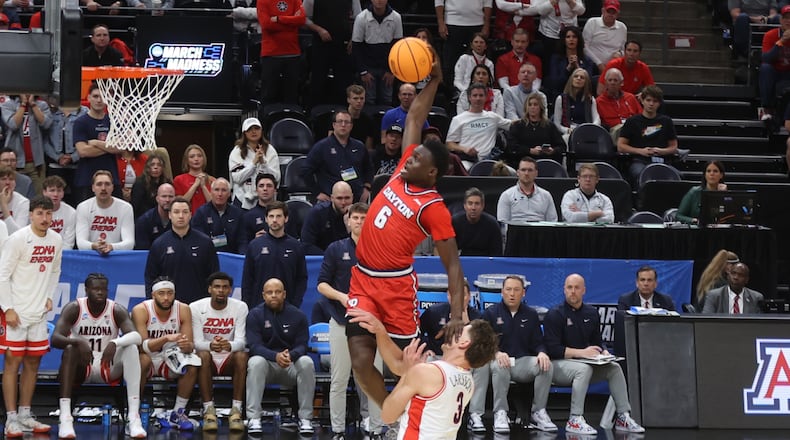 Dayton's Enoch Cheeks dunks in the first half against Arizona in the second round of the NCAA tournament on Saturday, March 23, 2024, at the Delta Center in Salt Lake City, Utah. David Jablonski/Staff