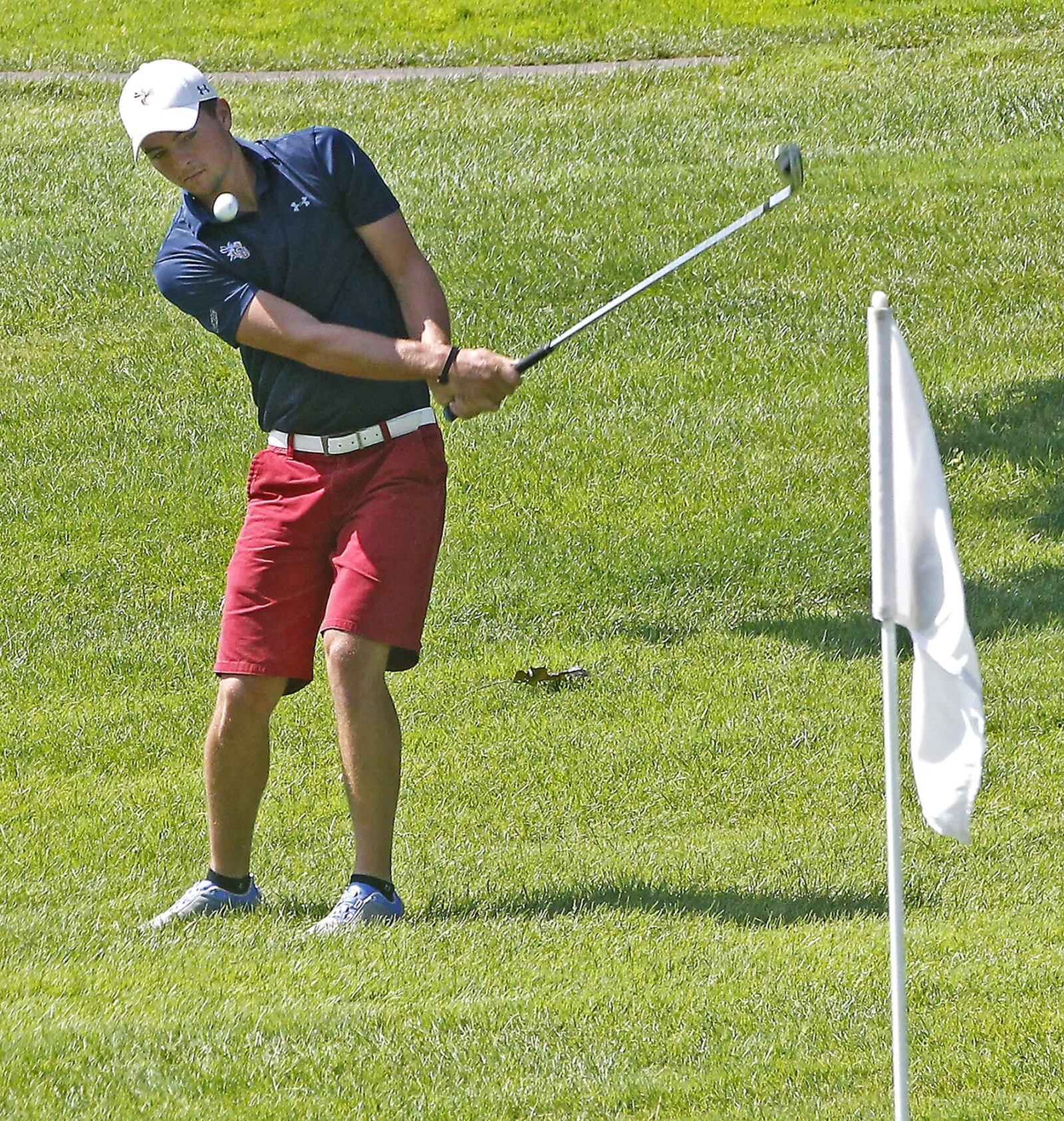 Cedarville golfer Jordan Reese chips onto the first green at the Springfield Country Club Friday, July 7, 2017. Reese will play in the Ohio Amateur next week. Bill Lackey/Staff