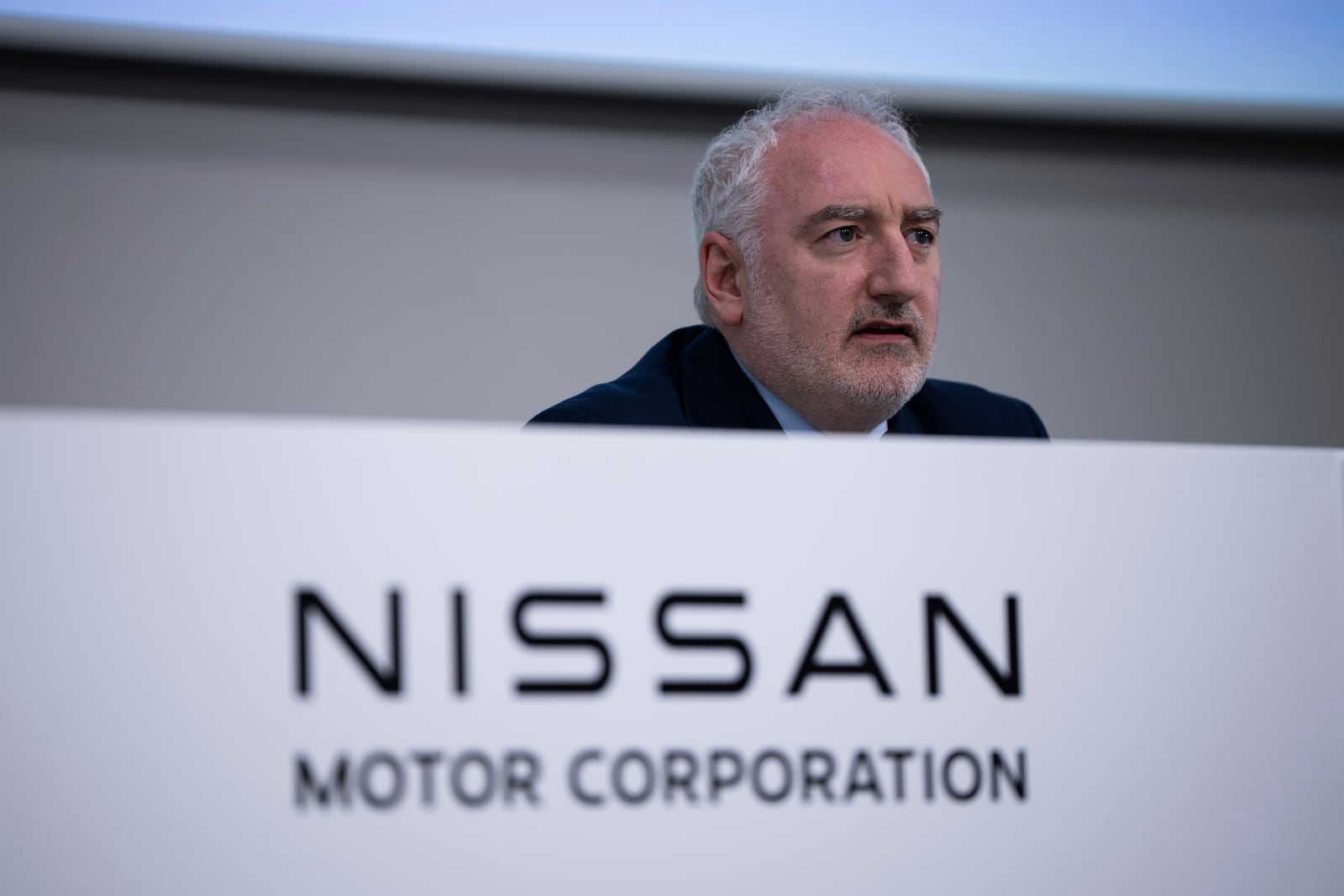 Nissan CFO Jeremie Papin attends a press conference to announce 2024 fiscal year financial results in Yokohama, Tuesday, May 13, 2025. (AP Photo/Louise Delmotte)