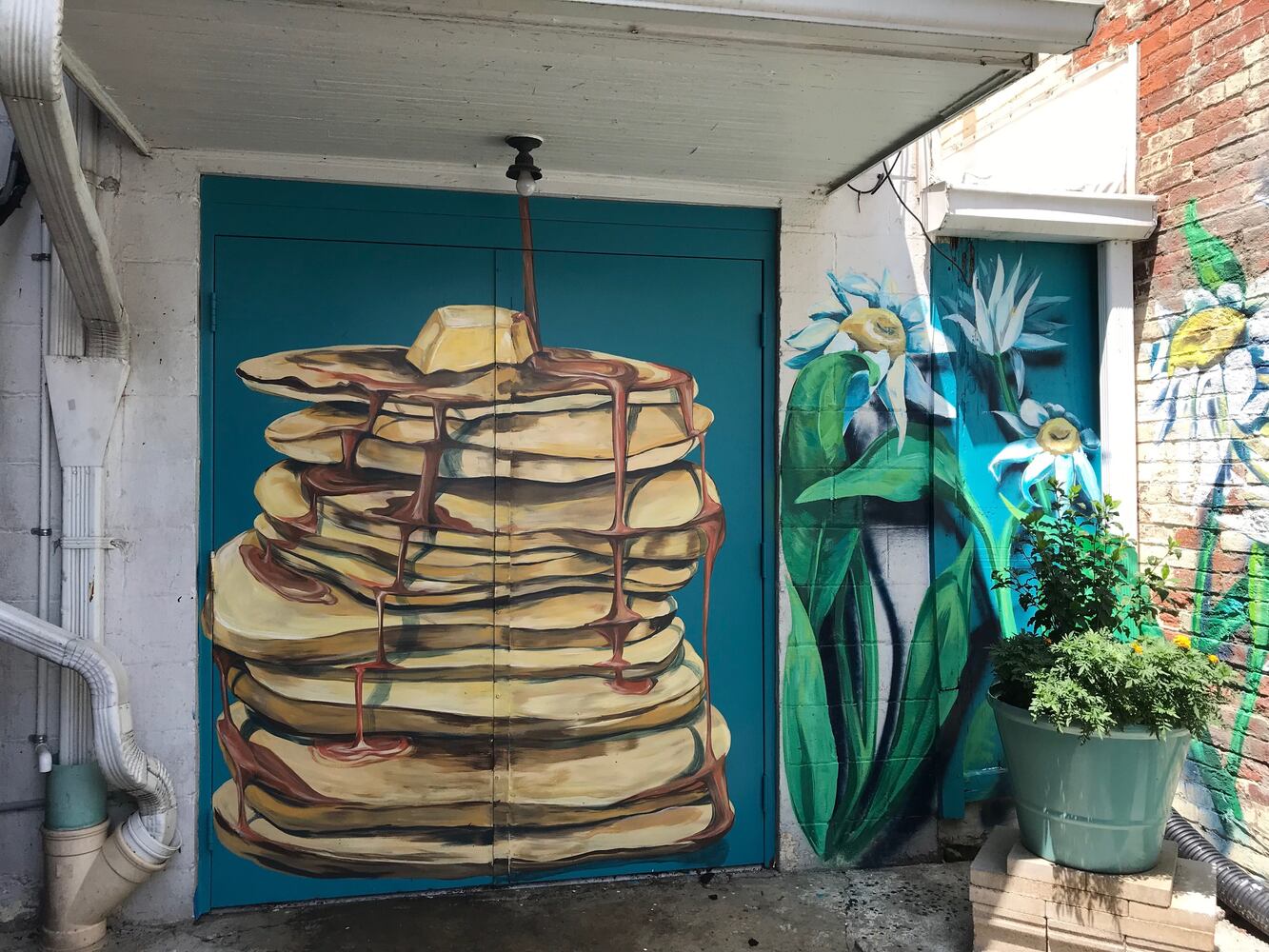 PHOTOS: This new downtown Dayton mural might make you hungry