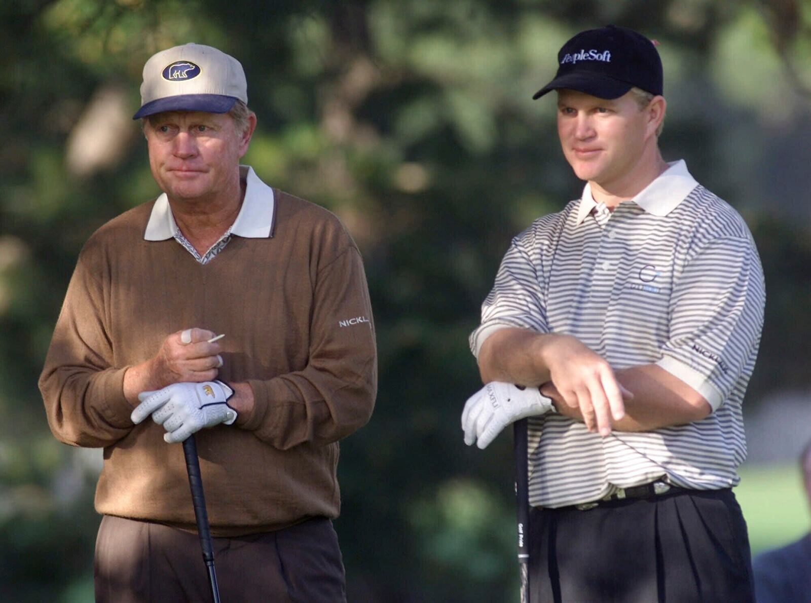 FILE - Jack Nicklaus, left, waits to tee off with son Gary Nicklaus on the sixth tee of the Pebble Beach Golf Links in Pebble Beach, Calif., Feb. 6, 2000. (AP Photo/Bob Galbraith, file)