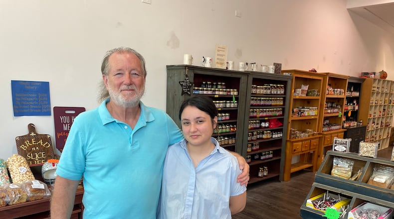 Maria’s Unique Foods has opened a second location at The Greene in Beavercreek after operating as a vendor at Dayton’s 2nd Street Market for nearly 12 years. Pictured is owner Michael Allen and his daughter, Alejandra Espinoza Allen. NATALIE JONES/STAFF