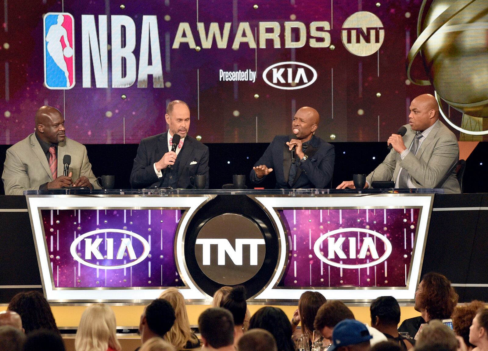 FILE - Shaquille O'Neal, from left, Ernie Johnson, Kenny Smith and Charles Barkley speak at the NBA Awards on Monday, June 25, 2018, at the Barker Hangar in Santa Monica, Calif. (Photo by Chris Pizzello/Invision/AP, File)