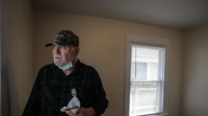Vietnam War veteran Chris Johnson looks out of his rebuilt bedroom to his new shed in the backyard. Chris and his wife, Dorothy, will soon move back to the home that Habitat for Humanity fixed after it was heavily damaged by a 2019 Memorial Day tornado.