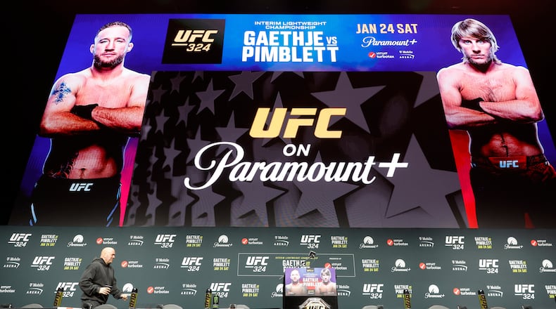 UFC President Dana White heads onto the stage before a news conference for UFC 324 Thursday, Jan. 22, 2026, in Las Vegas. (Steve Marcus/Las Vegas Sun via AP)