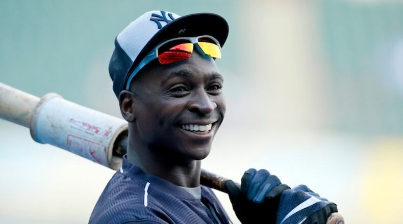 New York Yankees Didi Gregorius smiles during batting practice before a baseball game between the Chicago White Sox and the New York Yankees in Chicago, Tuesday, July 5, 2016. (AP Photo/Jeff Haynes)