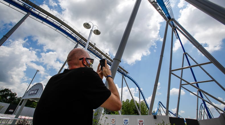 Coaster enthusiast Jared Ream rides the new Orion giga coaster on July 1 at Kings Island in Mason. Ream lost 190 pounds, motivated by his desire to ride this coaster. NICK GRAHAM/STAFF