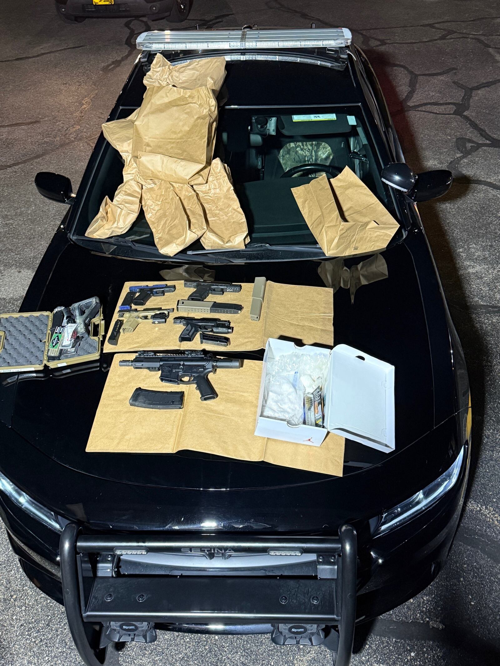 Montgomery County sheriff's deputies recovered multiple firearms and rounds of ammunition and bags of suspected narcotics during a search of a Gant Drive apartment in Harrison Twp. Wednesday, April 23, 2025. Photo courtesy they Montgomery County Sheriff's Office.