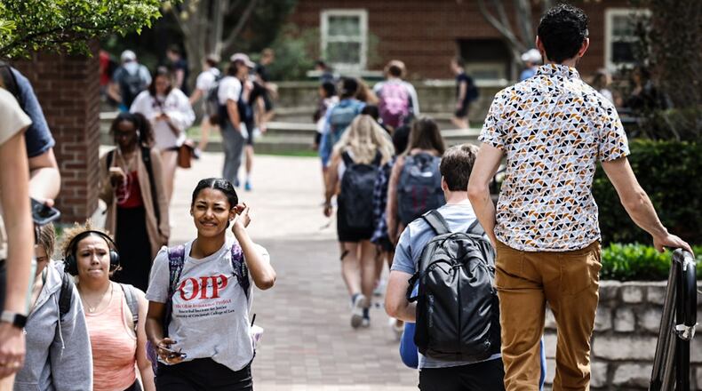 UD students walk to and from class Thursday April 20, 2023. The university is looking to raise $400 million for scholarships, faculty and academic programs. JIM NOELKER/STAFF