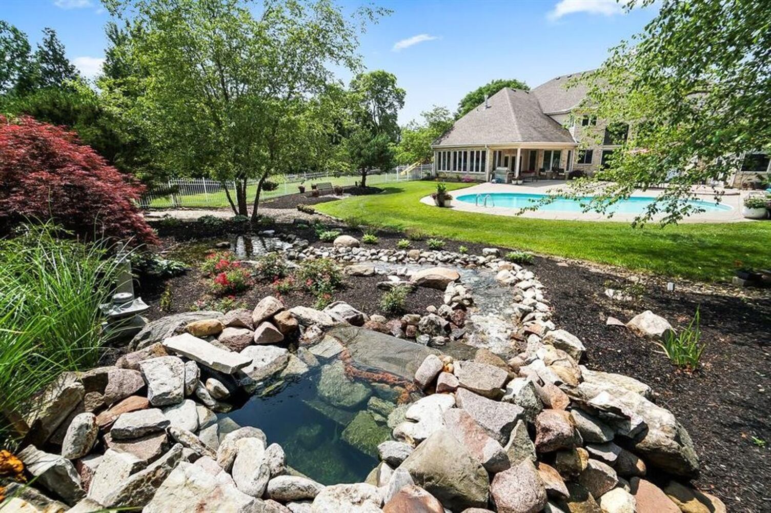 Photos: $1M luxury home listed has waterfall, swimming pool and kitchen to die for