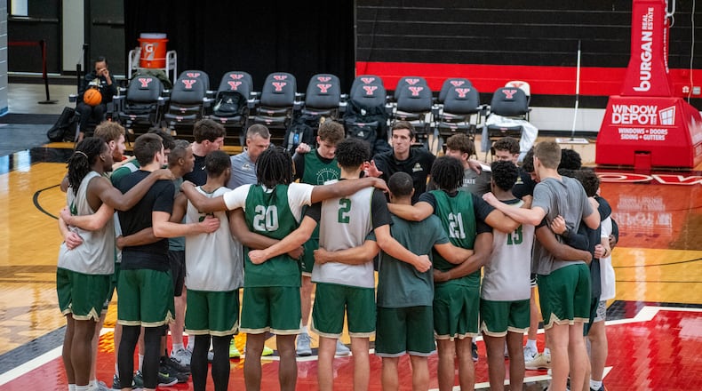 Wright State players and coaches huddle during a practice before a game at Youngstown State earlier this season. Wright State Athletics photo