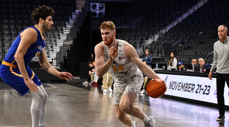 Wright State's Brandon Noel (right) drives against a UC Riverside player during the Vegas 4 tourney earlier this season. Noel scored 32 points Thursday in the Raiders' win over Green Bay. Wright State Athletics photo