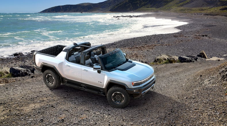 This undated photo provided by General Motors shows the 2022 GMC Hummer EV, an electric SUV that promises 1,000 horsepower via three electric motors. (General Motors via AP)