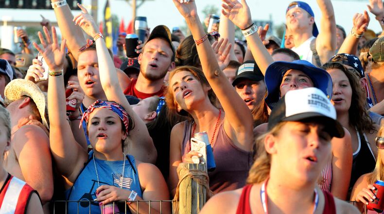 Fans enjoy a performance during the annual Country Concert at Hickory Hill Lakes in Ft. Loramie this July. DAVID A. MOODIE/CONTRIBUTED