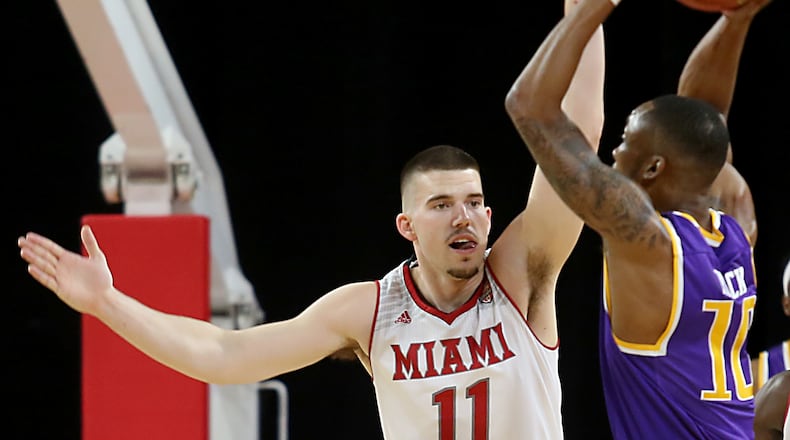 Miami forward Logan McLane covers Tennessee Tech guard Kajon Mack during their game at Millett Hall in Oxford Thursday, Dec. 22, 2016. Contributed photo by E.L. Hubbard